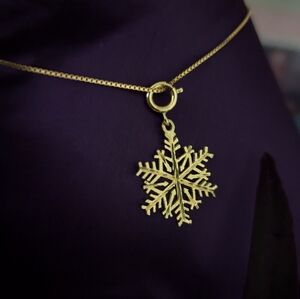 Beautiful 14k dz snowflake charm with 925 stamped gold colored necklace